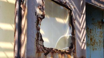 Rusted Portal Door Opening
